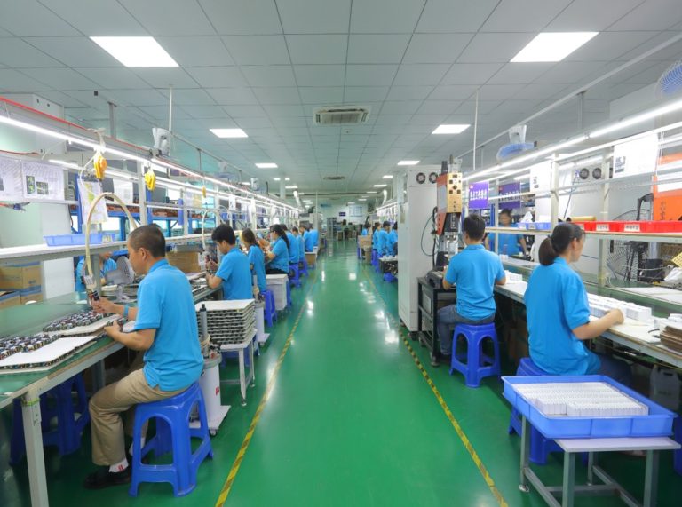 XJK power adapter manufacturing team at factory